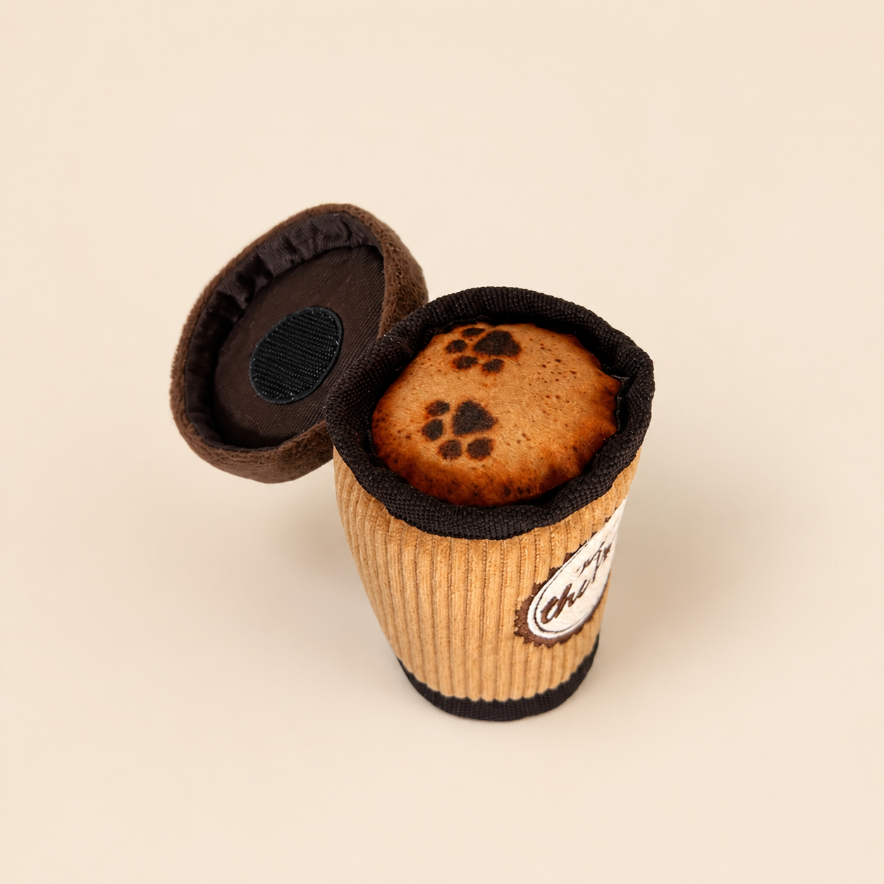 Top view of a soft coffee cup plush dog toy