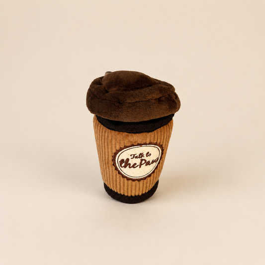 Puppuccino coffee cup plush dog toys on a neutral background