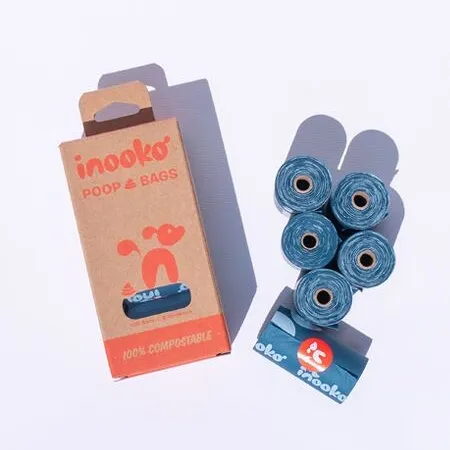 Compostable dog poop bag packs with blue bag rolls